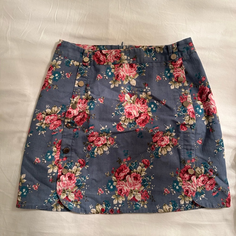 Kling Floral Mini Skirt with a button Detail
